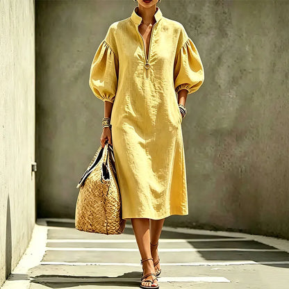Aislin - Vrouwelijke jurk met pofmouwen en hoge kraag